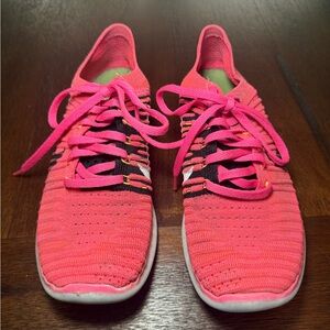 Women's Pink Athletic Nike RN FLYKNIT Shoes